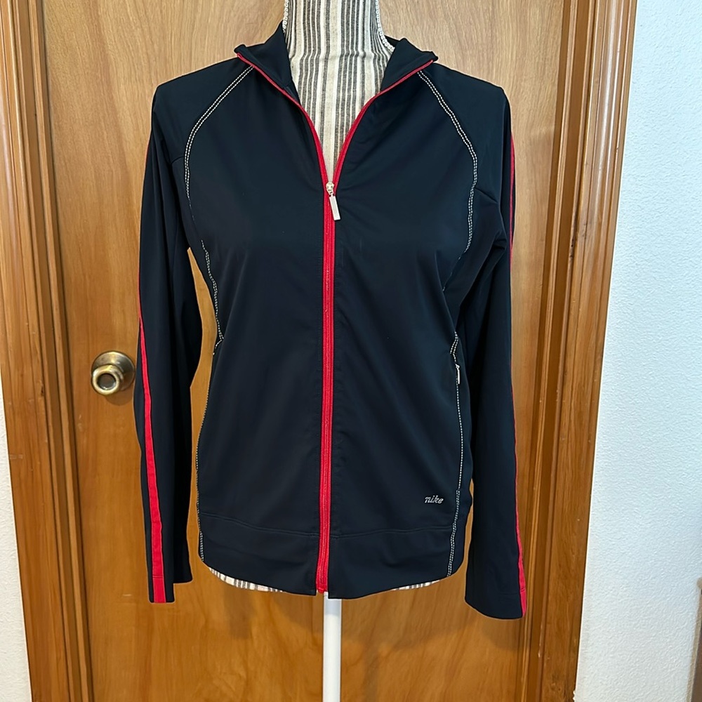 WOMANS NIKE GOLF JACKET SIZE SMALL (4-6) NAVY WITH RED DETAILS